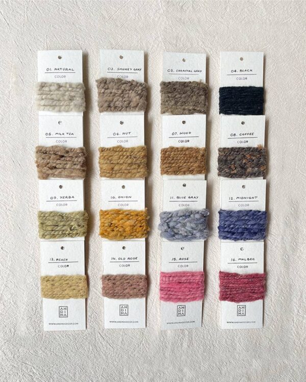 Pack of 16 handwoven color samples on cardboards presented on a white background.