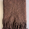 Folded chocolate brown wool throw with visible texture and fringe.