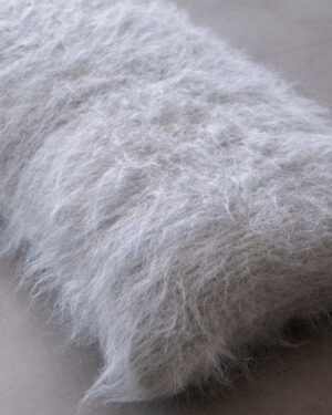 Macro detail of the Ash llama cushion’s brushed deep pile fiber