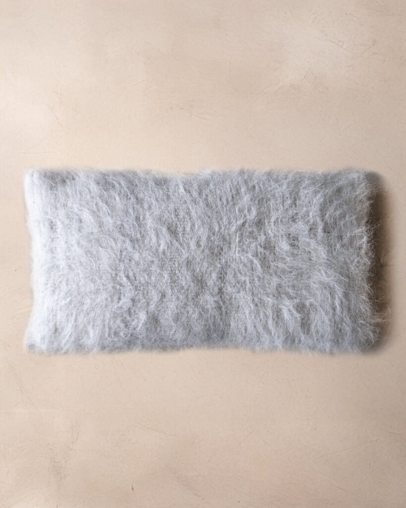 Llama lumbar pillow in Ash undyed deep pile, top view