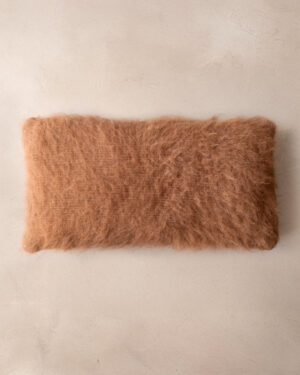 Handwoven llama lumbar cushion in Oak undyed deep pile, top view