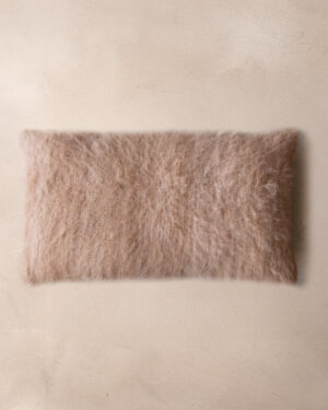 Handwoven llama lumbar cushion in Oat undyed deep pile, top view